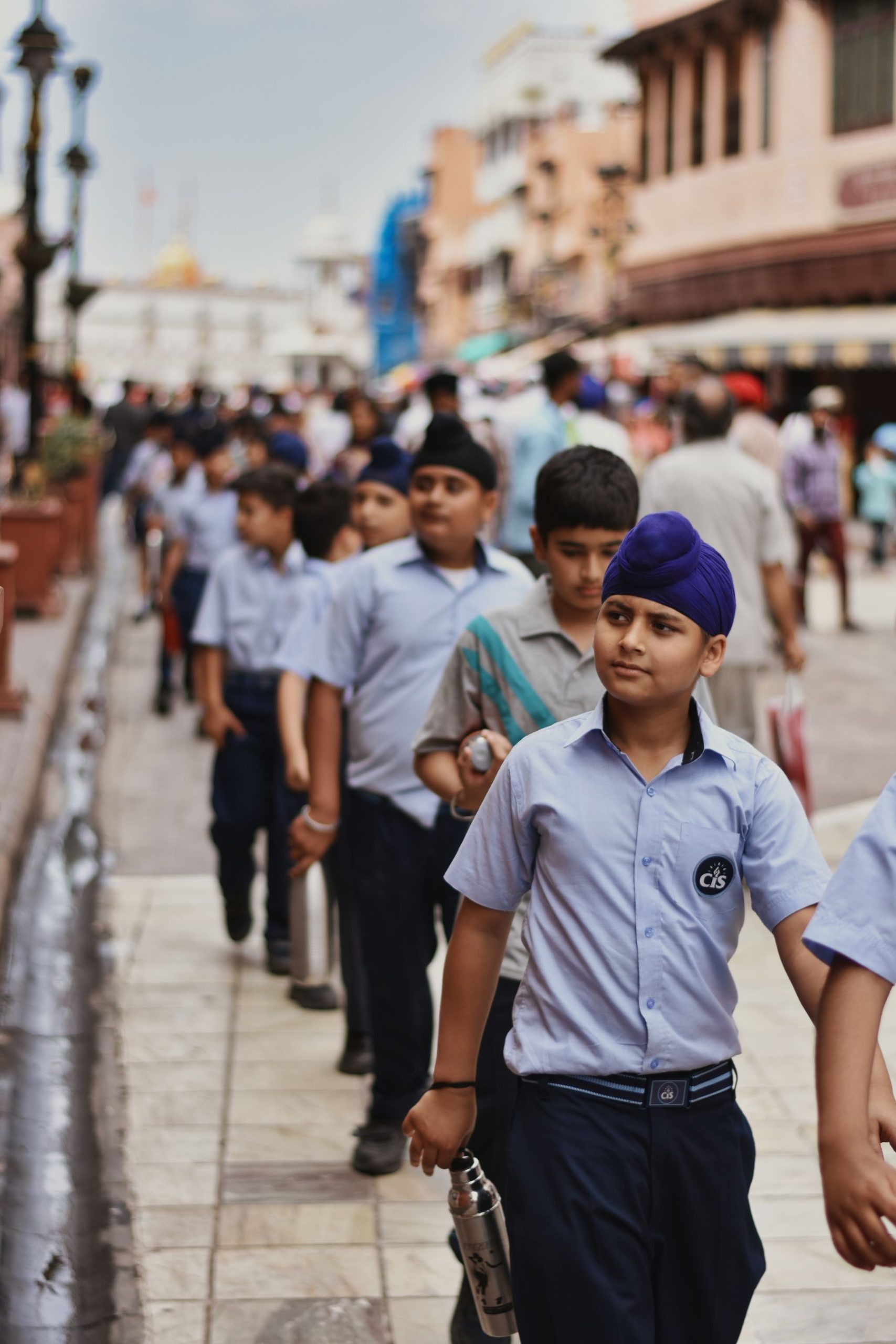 People walking a street in a north Indian city